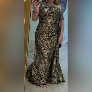 Alyce Paris 27620 metallic jacquard one-shoulder formal dress in gold-black.